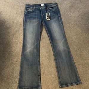 Size 12 bootcut low rise jeans. Brand New with tags